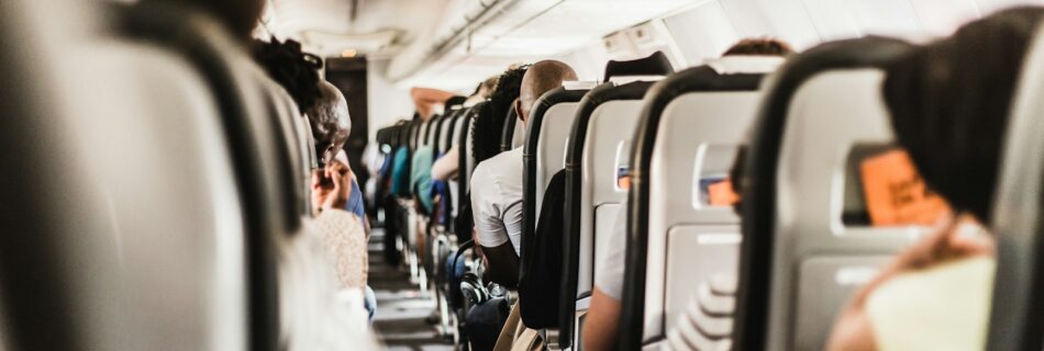 people seating in vehicle